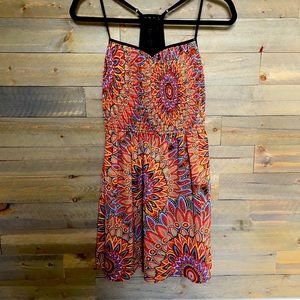 T- back floral dress. Cinched top.